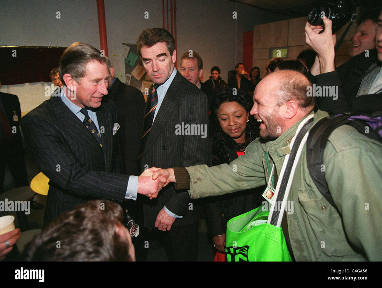 The Prince of Wales visiting the Big Issue office in London and meeting Big Issue seller John Castleman, who heckled him during his speech. Stock Photo