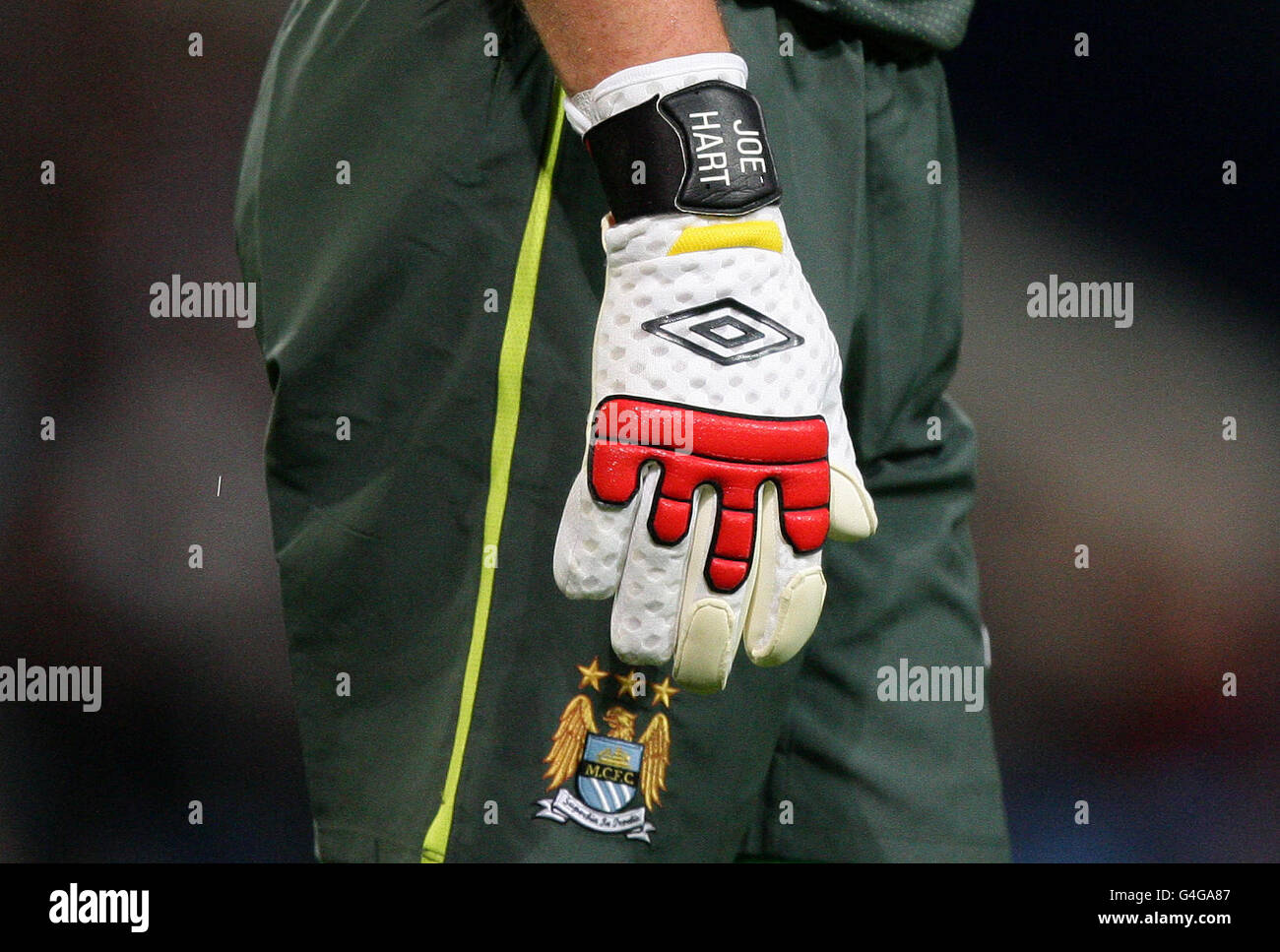 View of detail on Manchester City goal keeper Joe Hart's gloves and shorts  during the Barclays Premier League match at the Etihad Stadium, Manchester  Stock Photo - Alamy