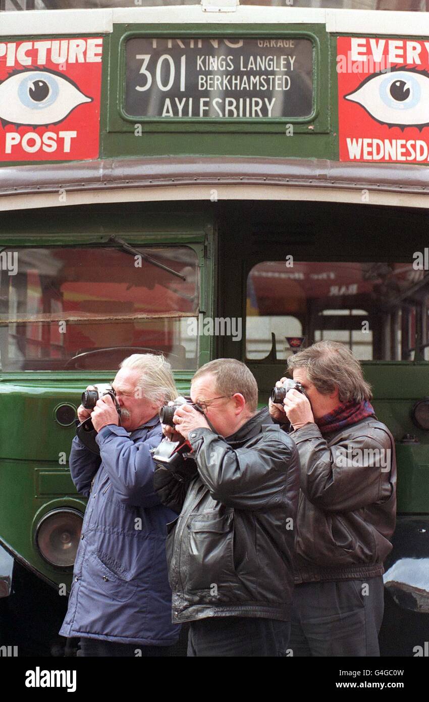 Bus enthusiasts photograph an old Bus at the Museum of London Transport in London's Covent Garden this morning December 5, 1998, before some of the rarest and most treasured hisoric buses are driven to 'The Depot' - a brand new Collections Centre for the Museum under construction in West London. Photo by Stefan Rousseau/PA Stock Photo