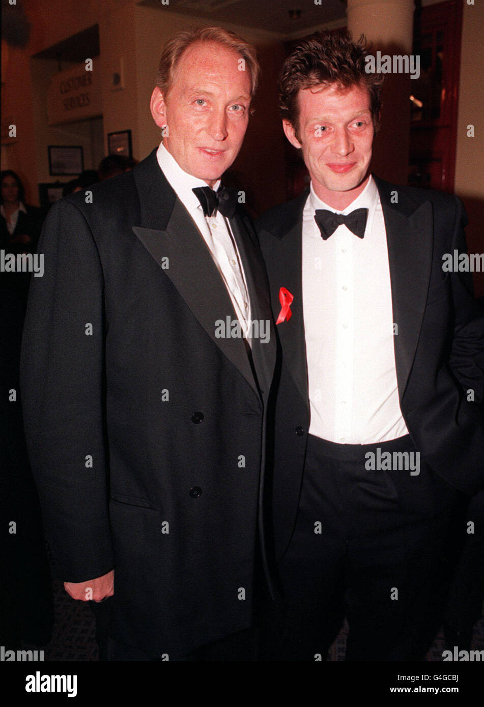 PA NEWS PHOTO 5/12/98 ACTORS CHARLES DANCE (LEFT) AND JASON FLEMYNG AT THE EUROPEAN FILM AWARDS, HELD AT LONDON'S OLD VIC THEATRE. Stock Photo