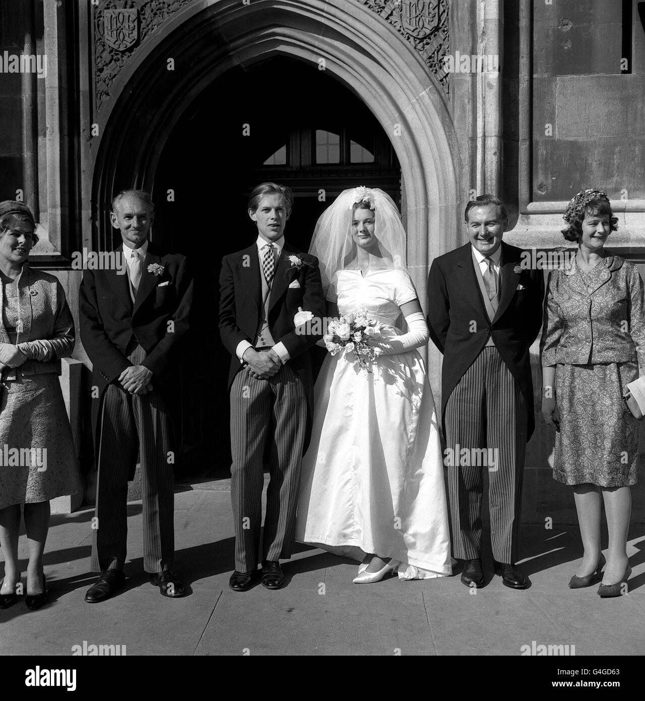 PA NEWS PHOTO 16/9/61  PETER JAY WEDDING TO MARGARET ANN CALLAGHAN AT THE HOUSE OF COMMONS CRYPT IN WESTMINSTER, LONDON. WITH THE BRIDE AND GROOM FROM LEFT IS DOUGLAS JAY (FATHER OF GROOM) AND RIGHT JAMES CALLAGHAN (FATHER OF BRIDE) Stock Photo