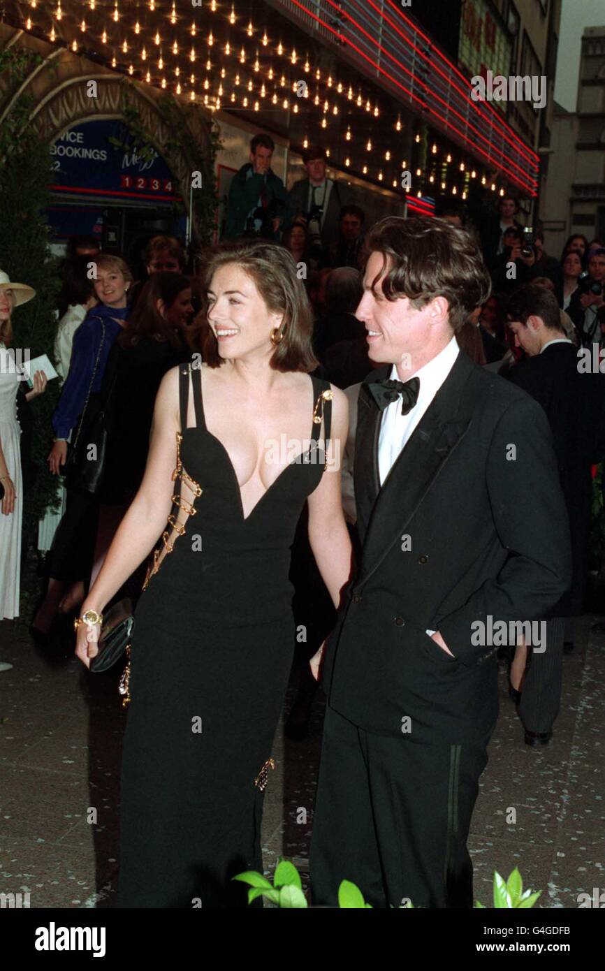 Hugh Grant & Liz Hurley Versace dress Stock Photo: 106082687 - Alamy