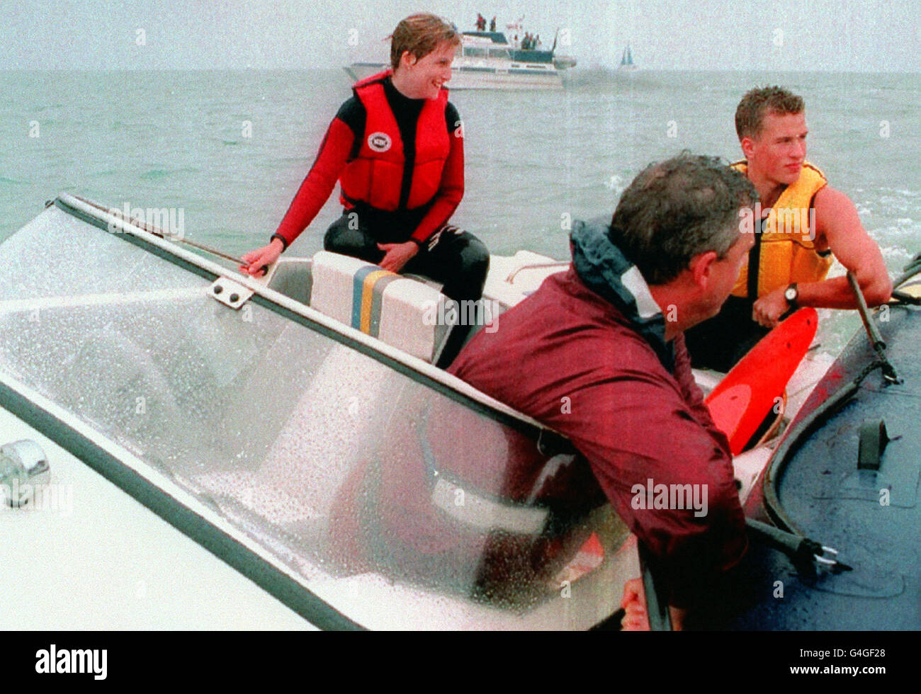 PA NEWS PHOTO 31/7/94 Prince Edward's girlfriend Sophie Rhys-Jones onboard a speedboat which picked her up after she fell whilst water Skiining. Peter Phillips, the son of the Princess Royal is on the right. Stock Photo