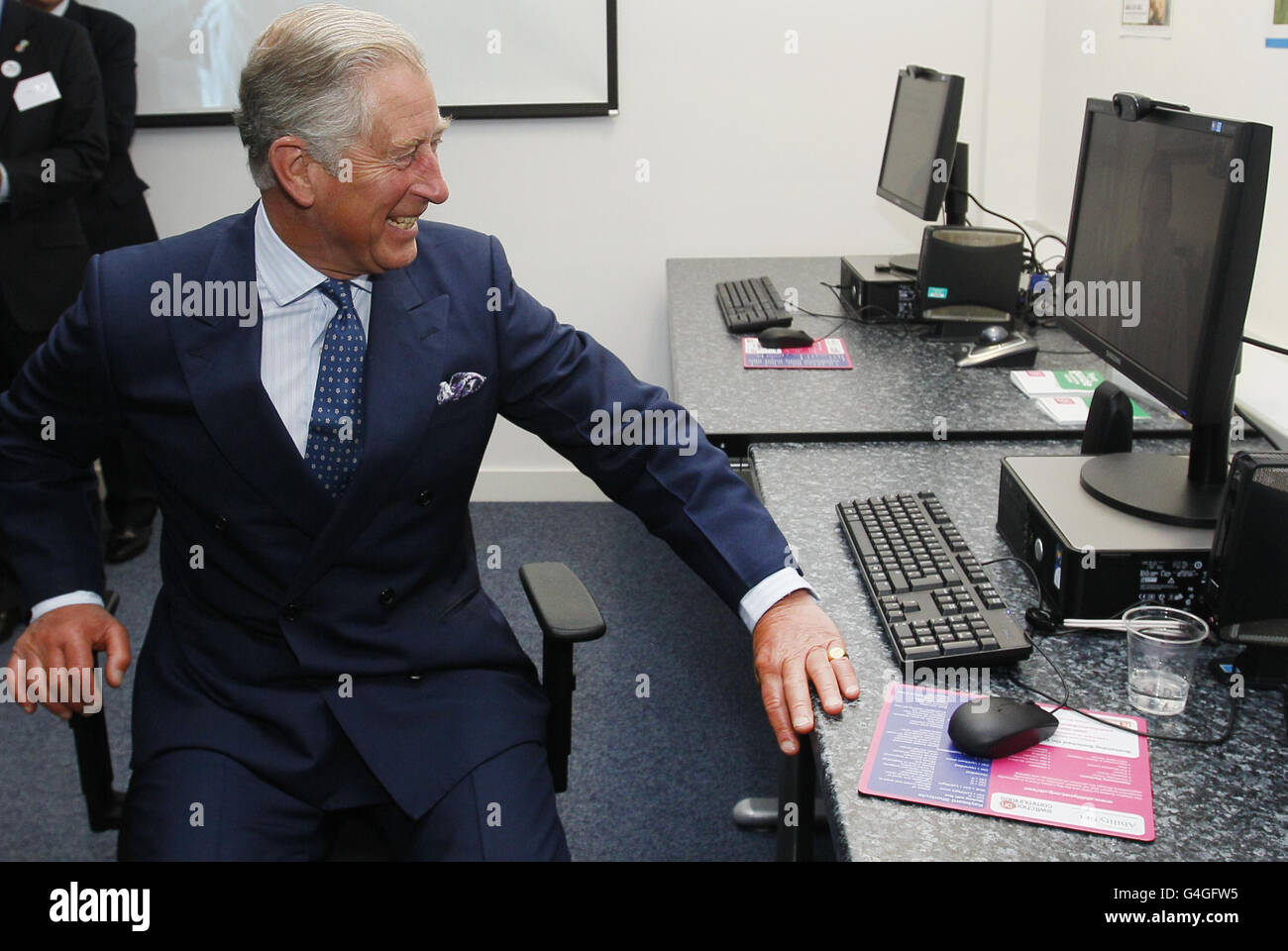 The Prince of Wales tries his hand at using 'Skype' for a video call on a computer, at Tavis House in London. Stock Photo