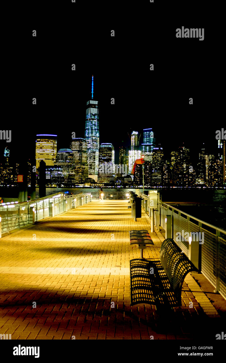 Paulus Hook Ferry Terminal at night with view of New York Skyline Stock