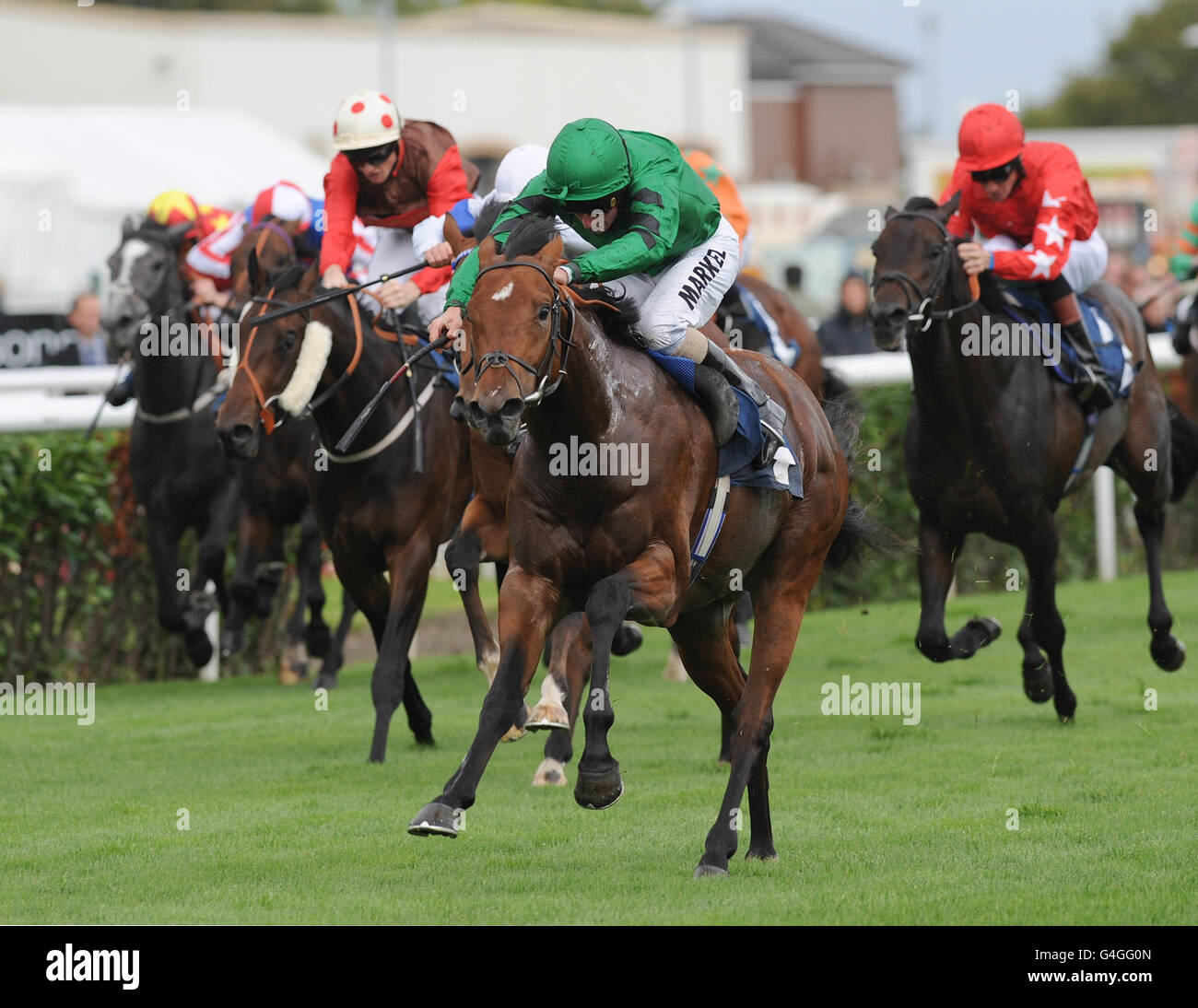 Ghostwriting and William Buick win the Arena Structures Nursery Handicap during the Welcome to Yorkshire St Ledger Festival Opening Day at Doncaster Racecourse, Doncaster. Stock Photo