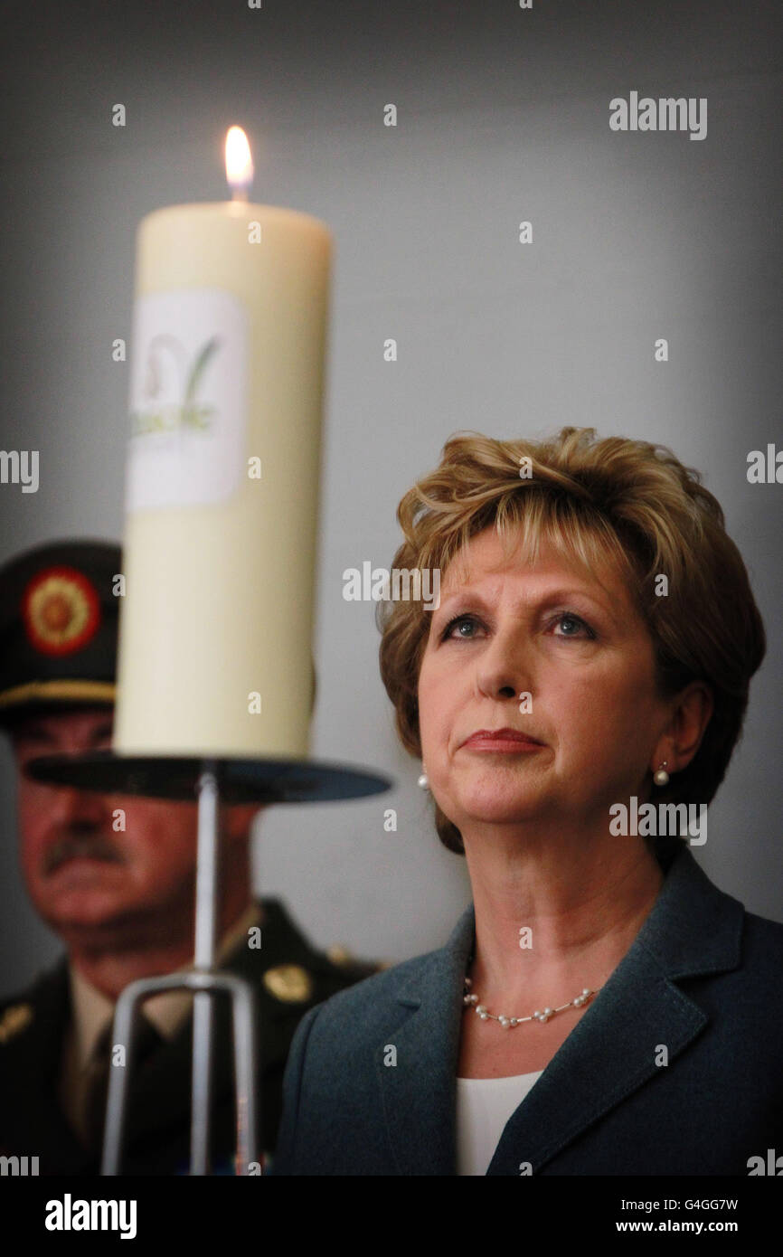 Irish President Mary McAleese gwith the candle of hope in the grounds of Kilmainham Hospital during the conference held by Console on suicide. Stock Photo