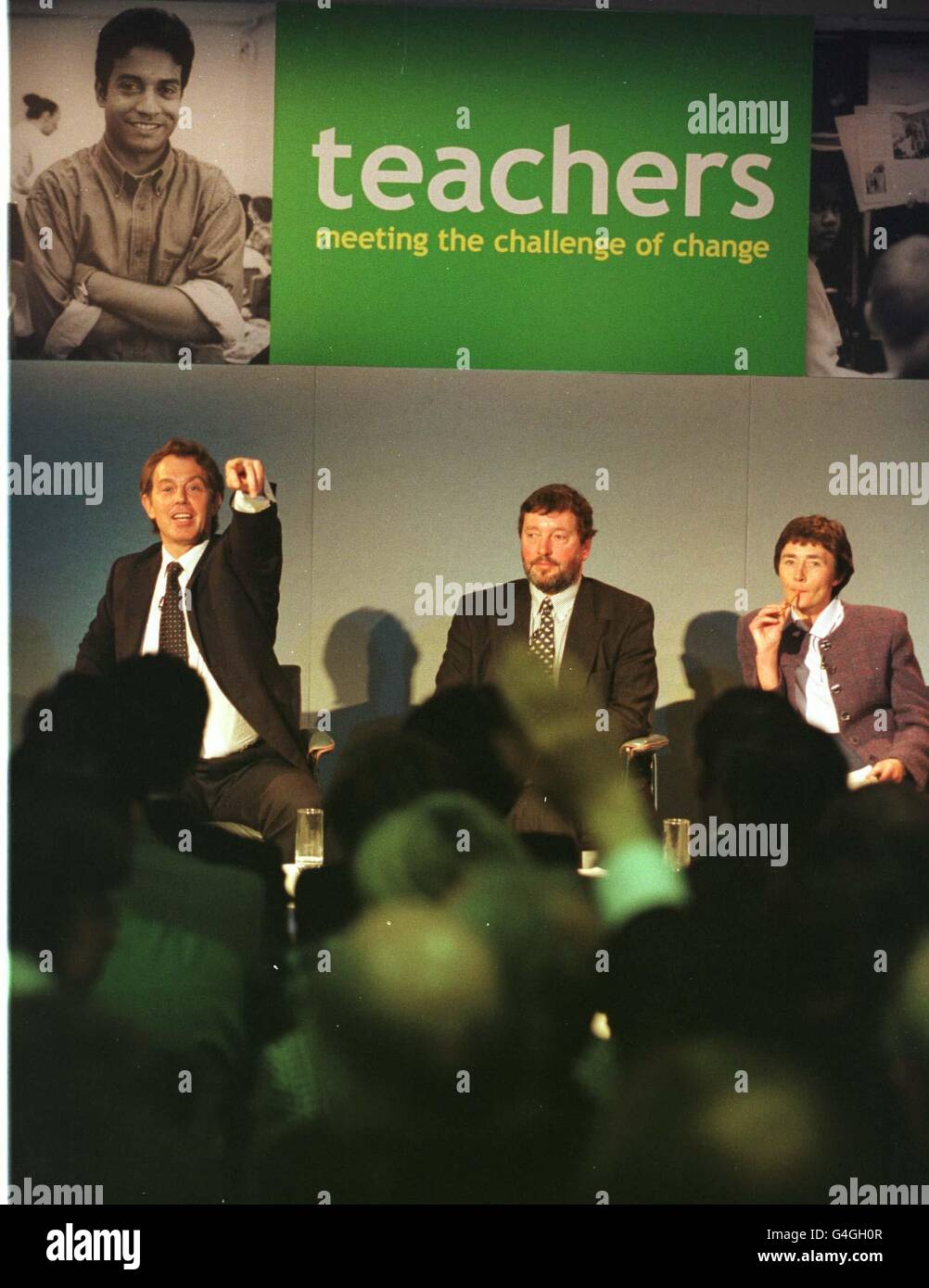 Britain's Prime Minister Tony Blair (l) takes questions from teachers and head teachers during a visit to Moulsham High School in Chelmsford, Essex, with Education Secretary David Blunkett and Schools Minister Estelle Morris. Stock Photo