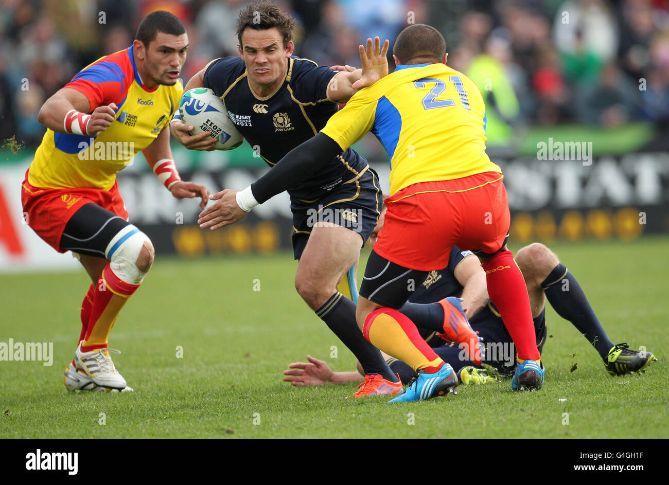 Scotland's Max Evans (centre) and Romania's Ionel Cazan during the IRB  Rugby World Cup match at Rugby Park, Invercargill Stock Photo - Alamy