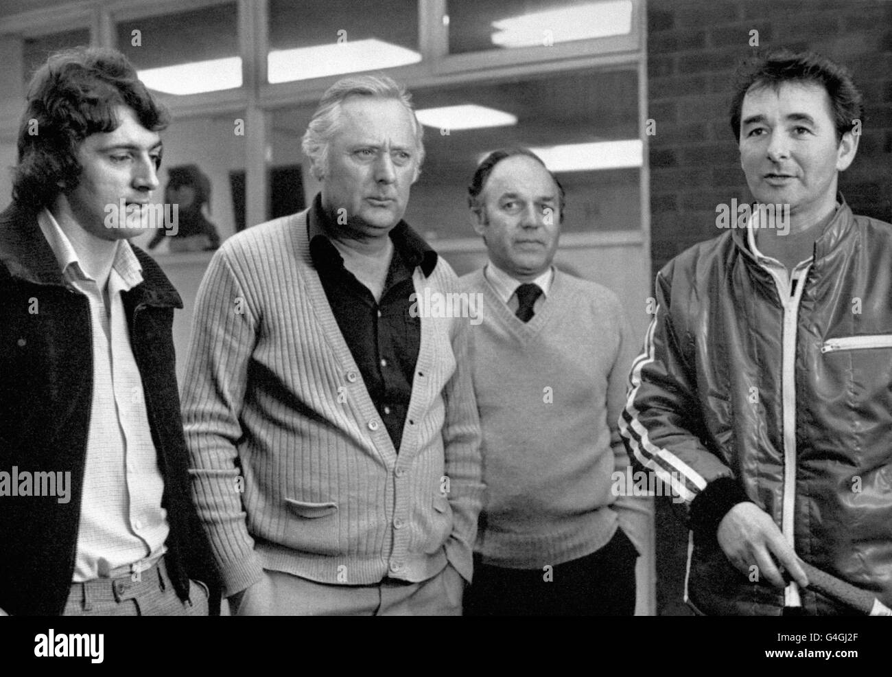 Birmingham City footballer Trevor Francis emerges from the City Ground in Nottingham after a five-hour meeting with, from second left, Nottingham Forest assistant manager Peter Taylor, secretary Ken Smailes, and manager Brian Clough, to discuss his possible move to Forest. Stock Photo