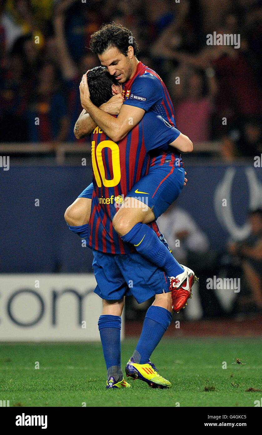 Barcelona's Francesc Fabregas celebrates with his team-mate Lionel Messi (10) after scoring his team's second goal of the match Stock Photo