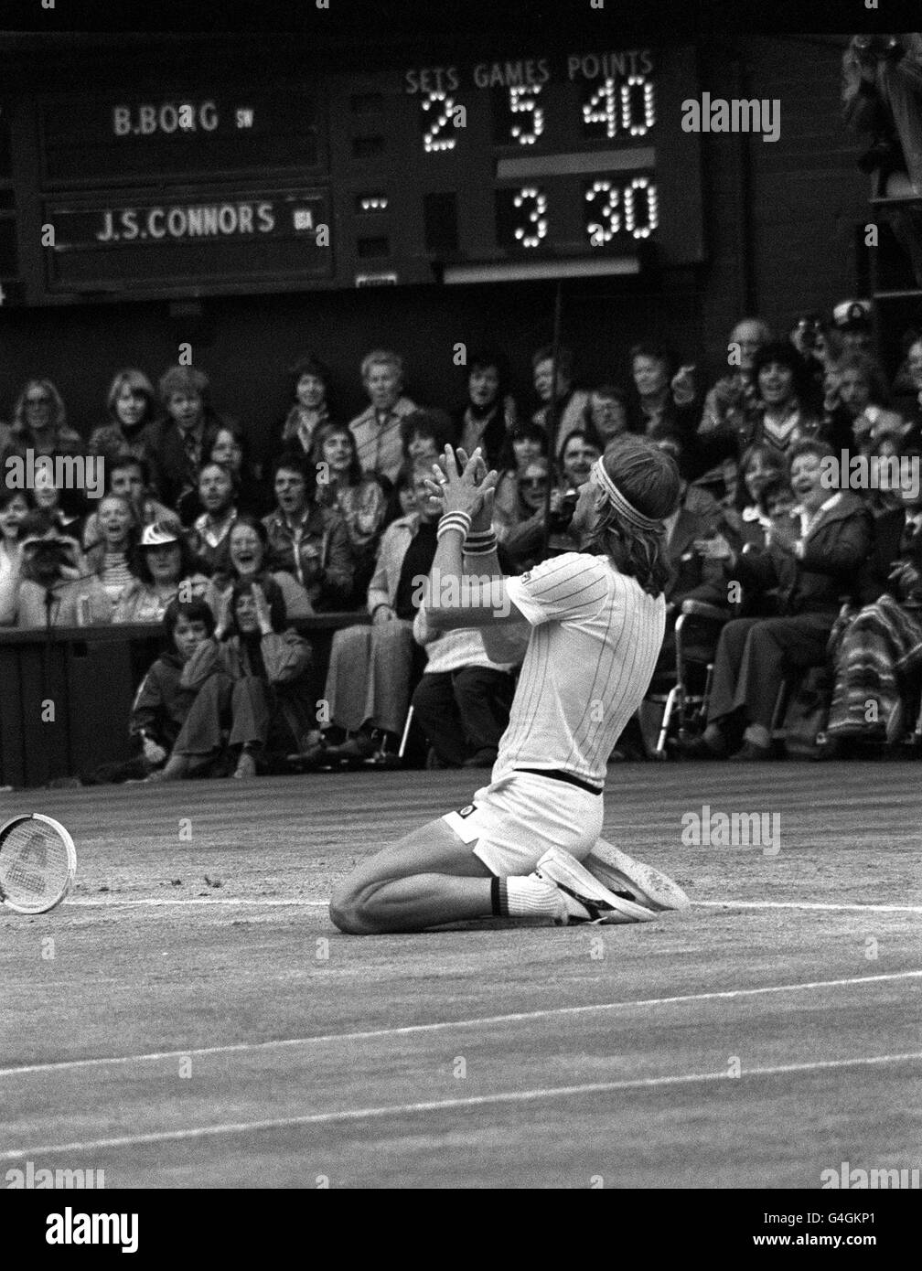 PA NEWS PHOTO 8/7/78  SWEDEN'S BJORN BORG DROPS TO HIS KNEES IN CELEBRATION ON THE CENTRE COURT AFTER WINNING THE MATCH IN THE MEN'S SINGLES FINAL AT WIMBLEDON. HE BEAT AMERICAN JIMMY CONNORS 6-2 6-2 6-3 Stock Photo