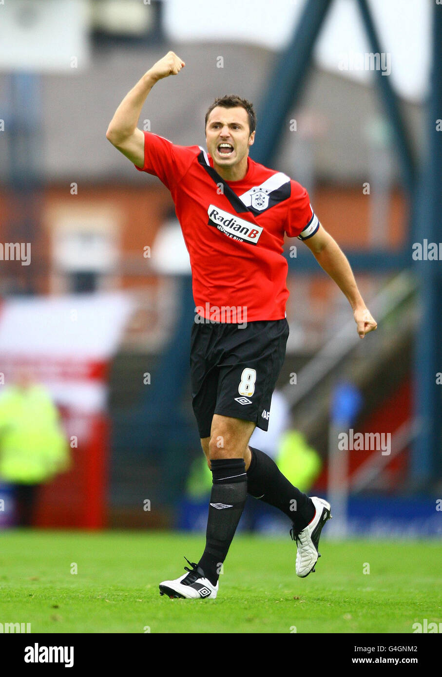 Huddersfield Town's Anthony Kay celebrates scoring during the npower Football League One match at Boundary Park, Oldham. Stock Photo