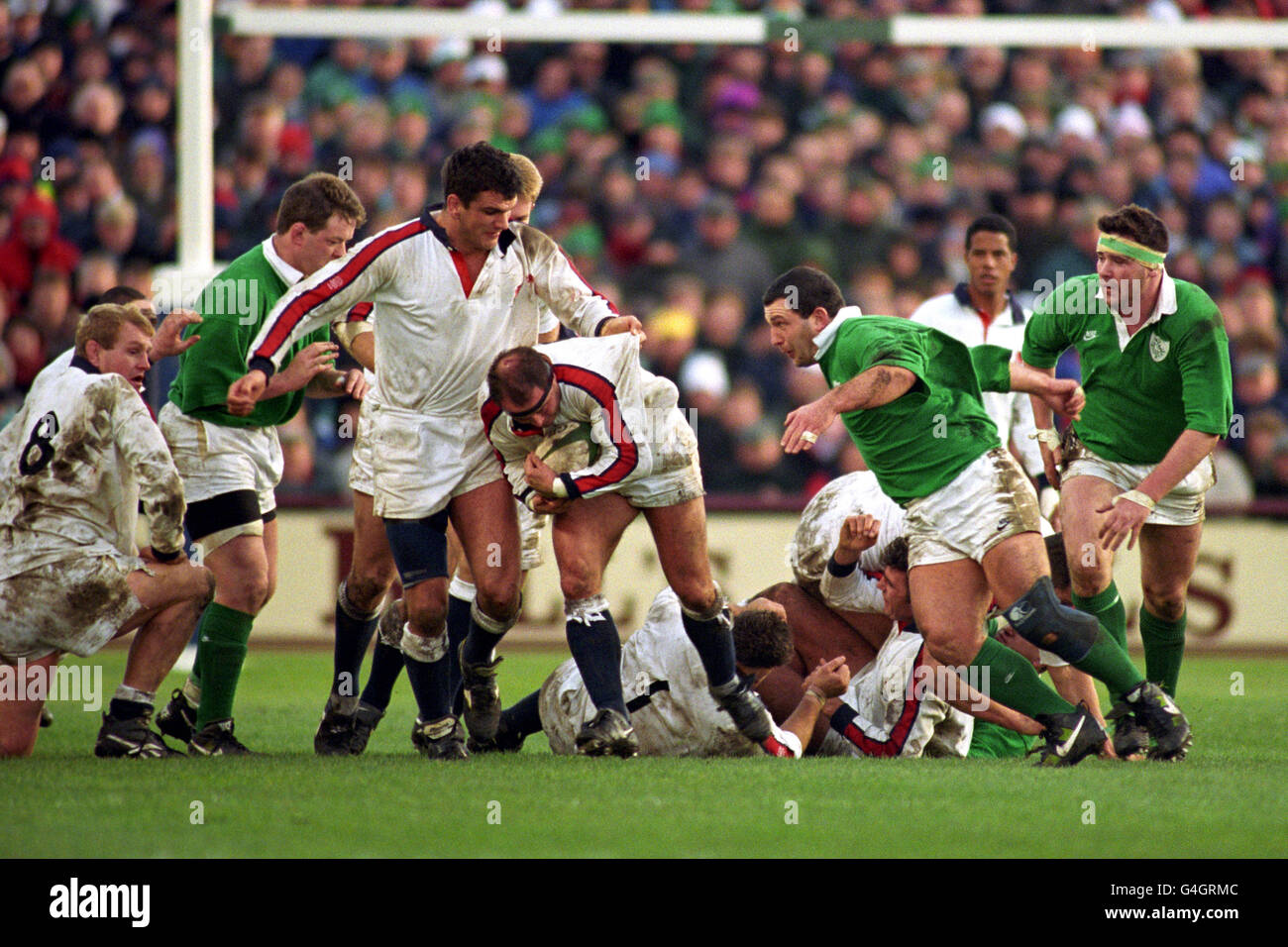 Rugby Union - Five Nations Championship - Ireland v England. England's Martin Johnson (c) helps Brian Moore (with ball) Stock Photo