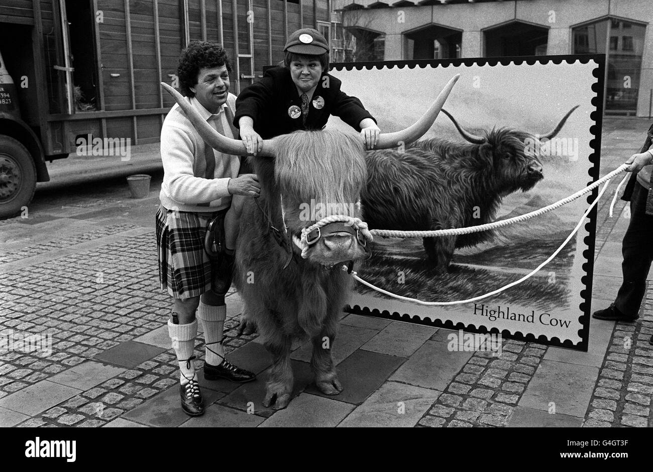 PA NEWS PHOTO 5/3/84  A LIBRARY PHOTO OF THE KRANKIES: IAN AND JEANETTE KRANKIE, THE HUSBAND AND WIFE COMEDY TEAM IN LONDON TO PROMOTE THE HIGHLAND COW NEW STAMP ISSUE. 15/12/04: Janette Tough (right), better known as Jimmy Krankie was taken to hospital after falling 20ft from a giant beanstalk during a Christmas pantomime at the Pavilion Theatre in Glasgow. Stock Photo
