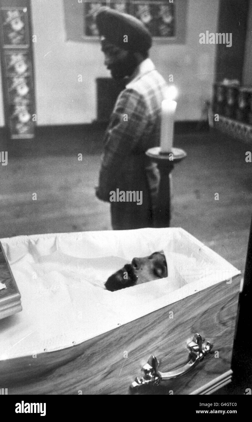 PA NEWS PHOTO 12/6/79 AN ASIAN MOURNER KEEPS VIGIL BY THE OPEN COFFIN AS THE BODY OF BLAIR PEACH LIES IN STATE IN THE FOYER OF THE DOMINION CINEMA, SOUTHALL, WEST LONDON. THE FUNERAL TAKES PLACE IN EAST LONDON TOMORROW. MR PEACH A 33 YEAR OLD TEACHER AND ANTI NAZI LEAGUE SUPPORTER, DIED IN THE SOUTHALL RIOTS IN APRIL WHEN PROTESTORS AGAINST A NATIONAL FRONT ELECTION MEETING CLASHED WITH POLICE Stock Photo
