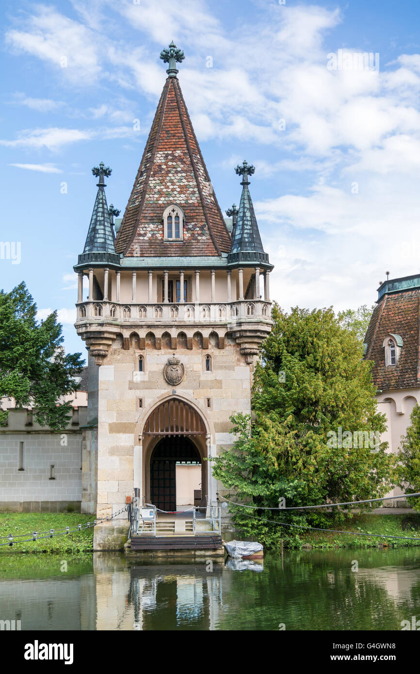 Tower of Franzensburg Castle and pond in Laxenburg castle gardens near Vienna, Lower Austria Stock Photo