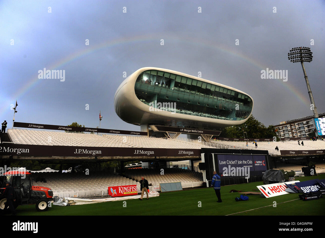 A rainbow is seen behind the JP Morgan media centre as the game is abandoned due to rain during the Fourth ODI at Lords Cricket Ground, London. Stock Photo