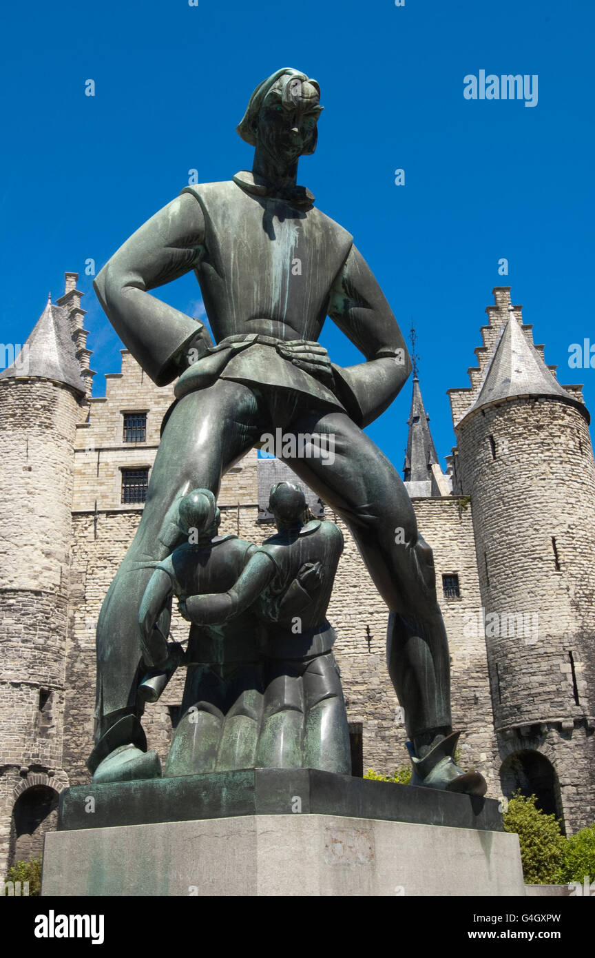 Lange Wapper statue in front of medieval castle called The Stone on the banks of the river Schelde in Antwerp, Flanders, Belgium Stock Photo
