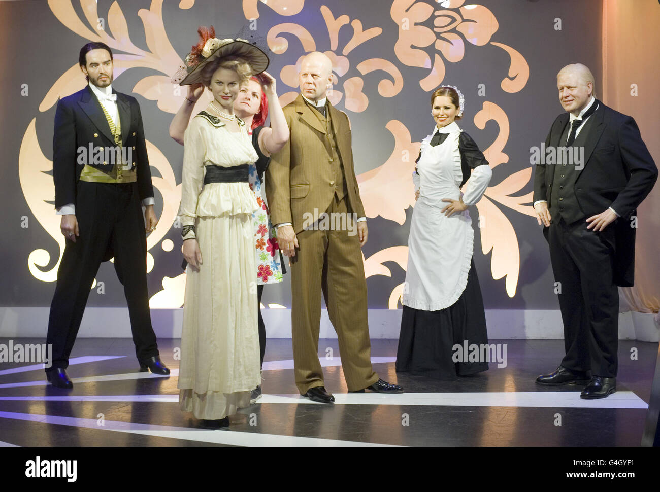 Wardrobe supervisor Jane Anderson makes final alterations to Wax