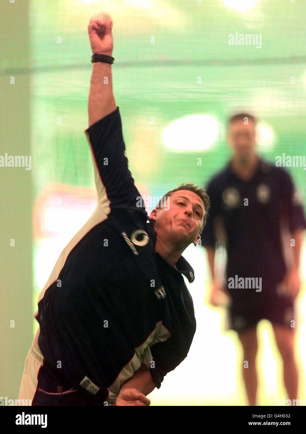 England's Darren Gough practices his bowling in the indoor nets at the Sydney Cricket Ground the day before the first one-day international triangular series final against Australia. The match is in doubt following three days of heavy rain in Sydney. Stock Photo
