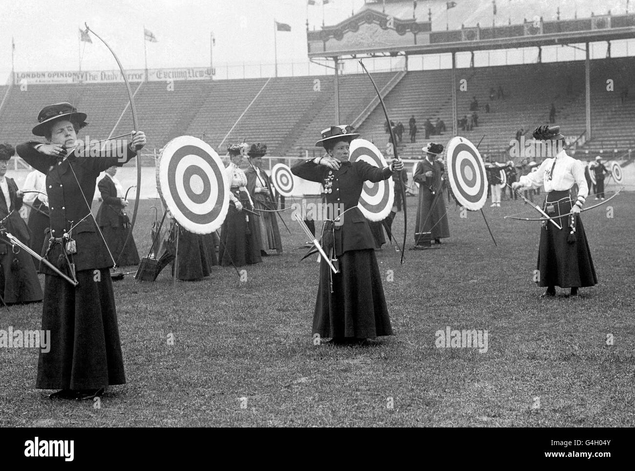 Lady archers in competition at the 1908 London Olympic Games. Stock Photo
