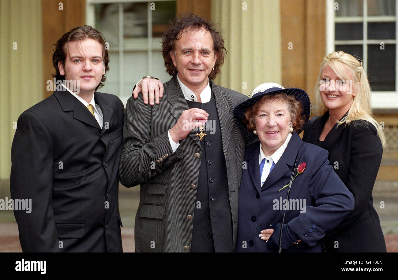 Singer David Essex at Buckingham Palace in London with his mother ...