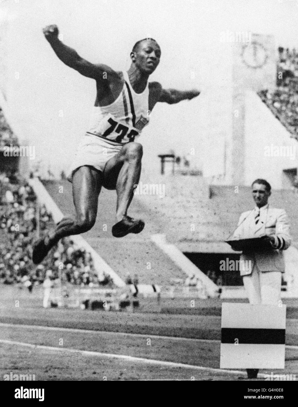 Athletics - Olympic Games Berlin - Men's Long Jump. Jesse Owens, USA, wins the Long Jump. Stock Photo