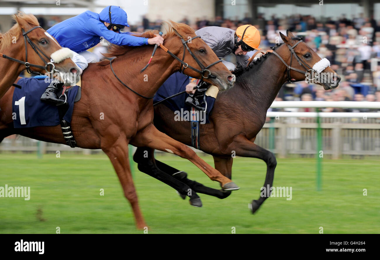 Dandy ridden by Jimmy Fortune (right) goes on to win the E.B.F. Zamindar Maiden Stakes during The Cambridgeshire Meeting at Newmarket Racecourse, Newmarket. Stock Photo