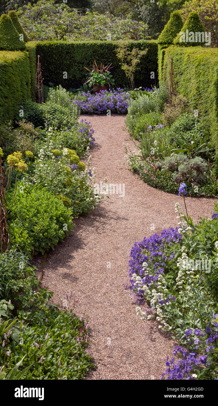 Hedged Garden with gravel path Stock Photo