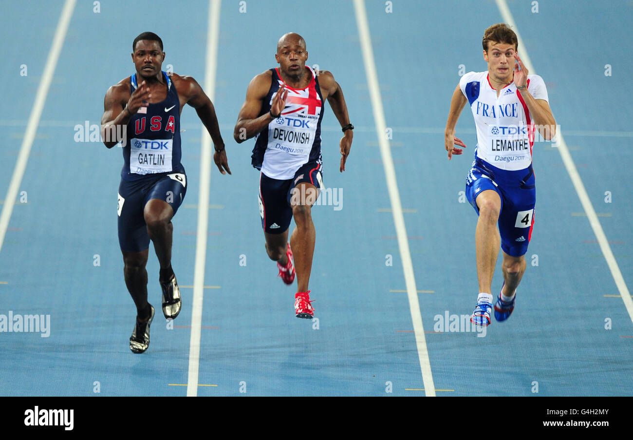 Great Britain's Marlon Devonish (c) during his 100m heat with USA's Justin Gatlin (l) and France's Christophe Lemaitre Stock Photo