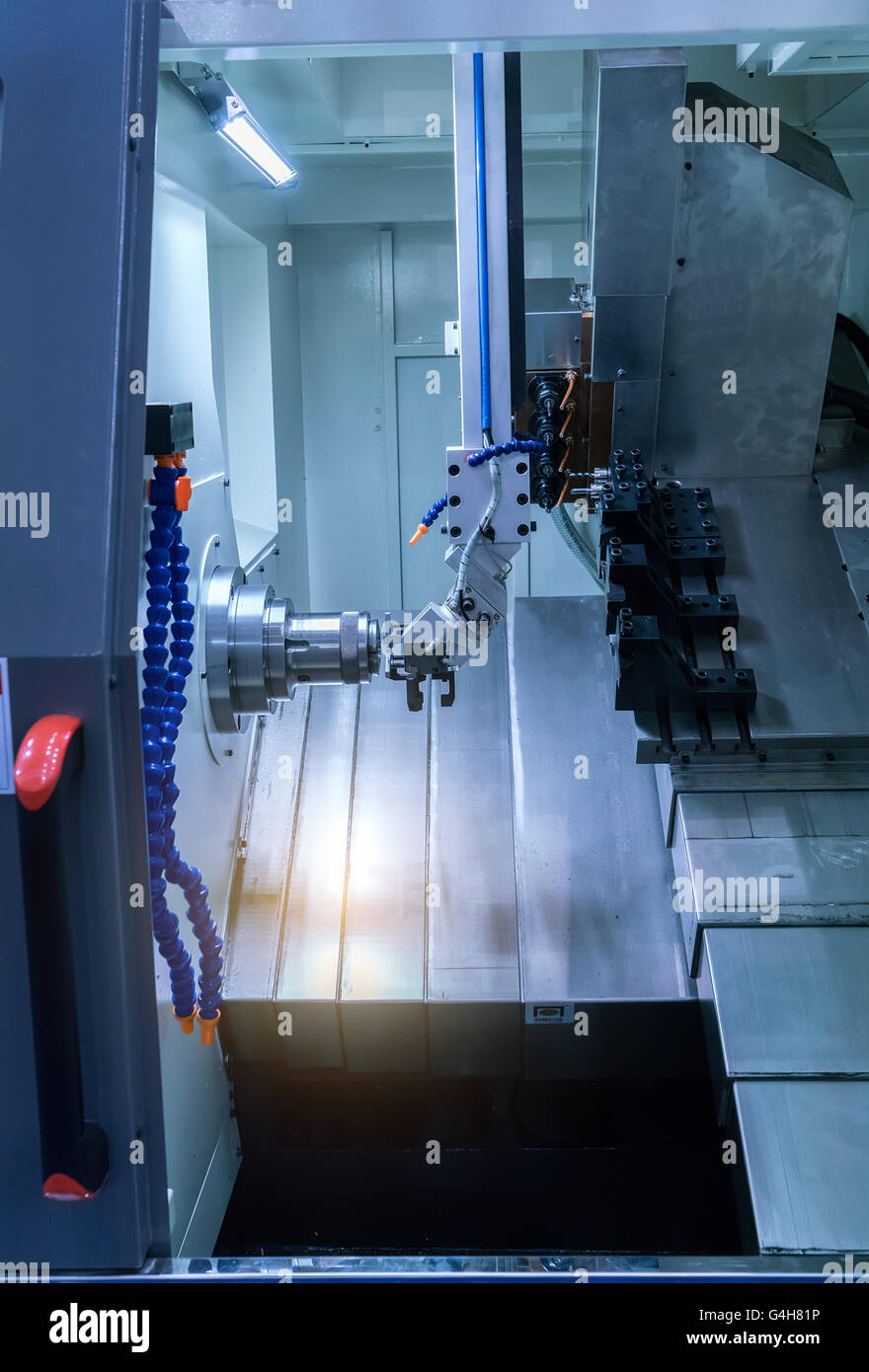 CNC milling machine milling heads in metal industry Stock Photo Alamy