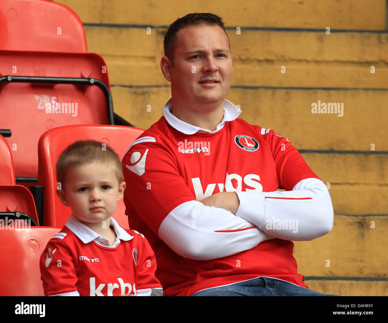 Fans watch the game during the npower Football League One match at The Valley, London. Stock Photo
