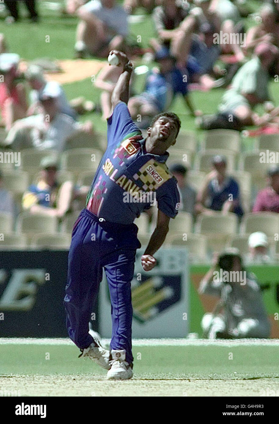 Sri Lankan bowler Muttiah Muralitharan, who was called for chucking by square leg umpire Ross Emerson, in action against England at the Adelaide Oval. Stock Photo
