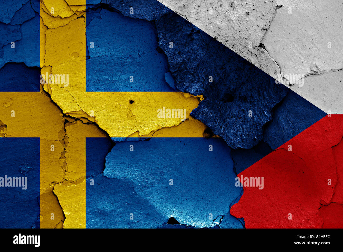 flags of Sweden and Czechia painted on cracked wall Stock Photo
