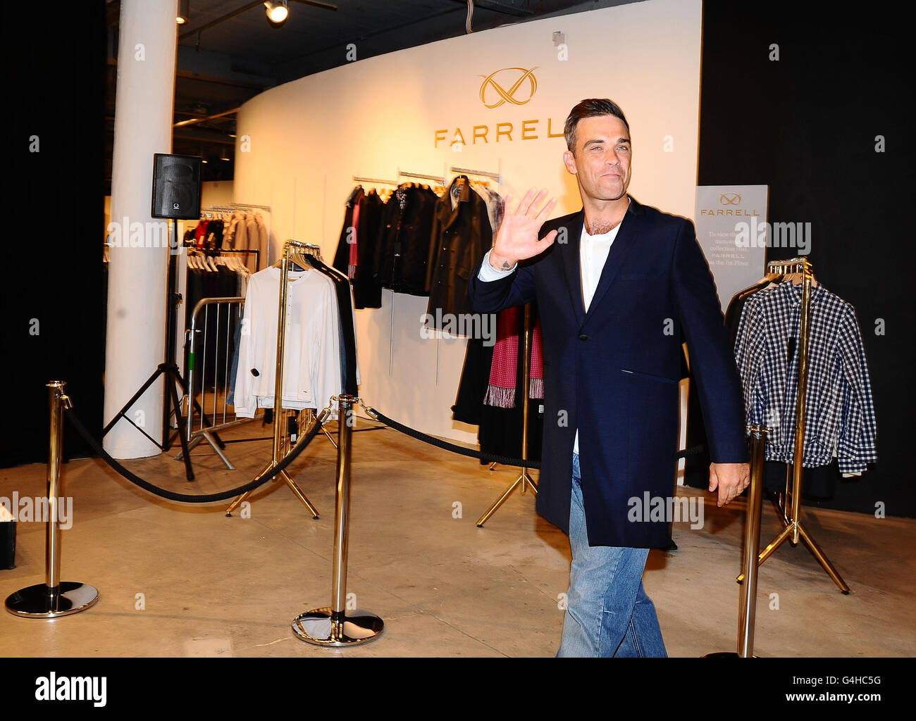 Robbie Williams launches his menswear label Farrell and its debut  autumn/winter 2011 collection at House of Fraser in Oxford Street, London  Stock Photo - Alamy