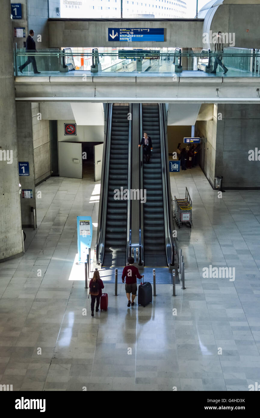 Airport Escalator and bridge Charles de Gaulle terminal F in Paris