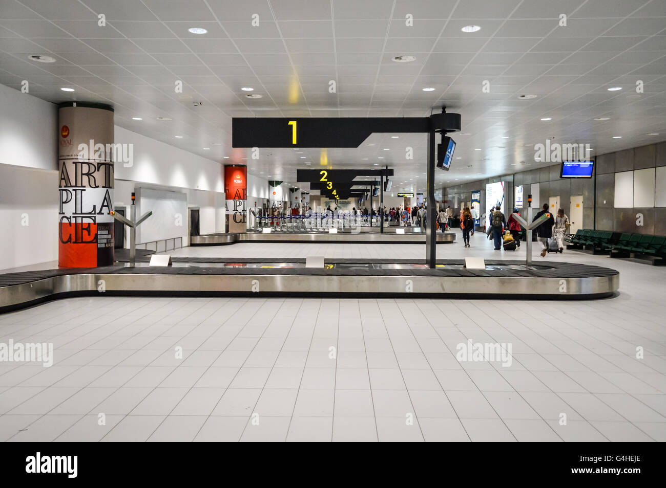 luggage belts row at the arrivals area of Guglielmo Marconi Airport in