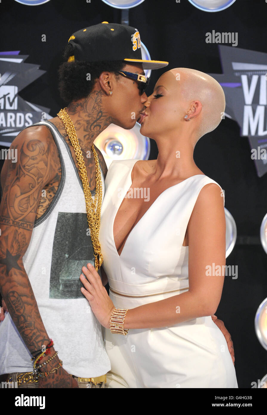 Amber Rose and Wiz Khalifa arrive at the MTV Video Music Awards 2011 at Nokia Theatre L.A. LIVE in Los Angeles, USA. Stock Photo