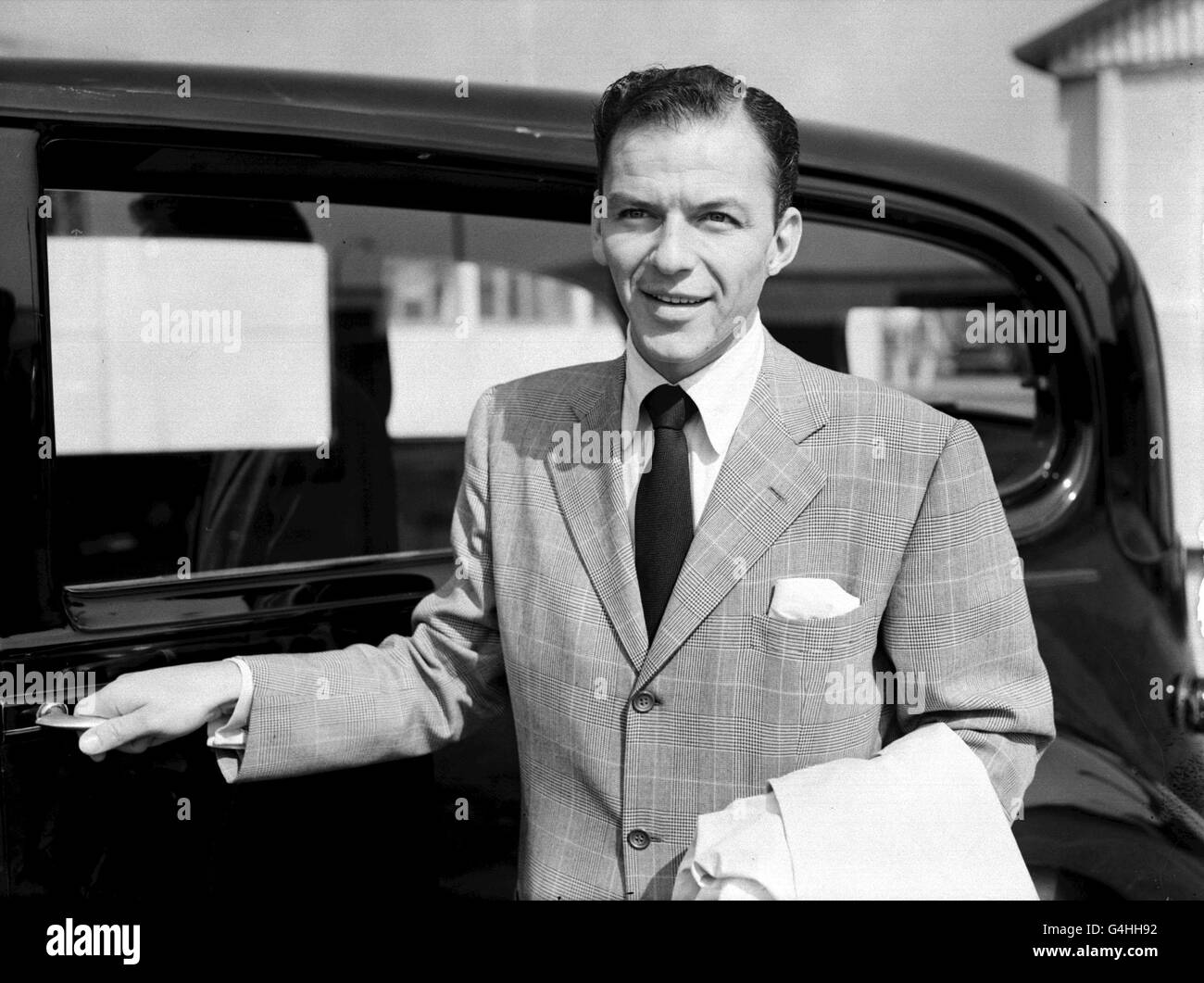Frank Sinatra at London's Heathrow Airport on his return from his trip to America. Stock Photo
