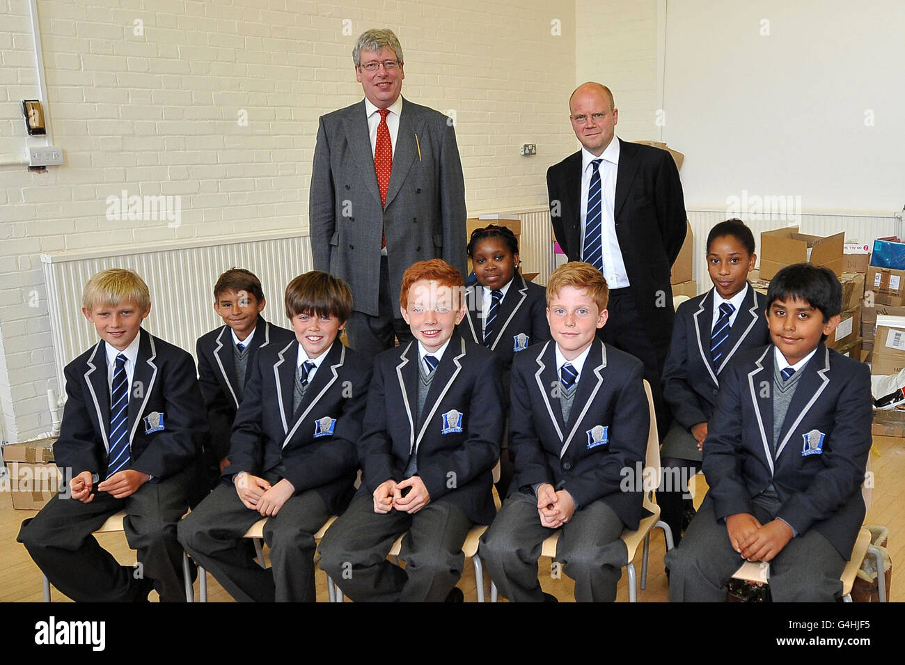 Headmaster Tom Packer, left, and Chair of Governors Toby Young meet Year  Seven pupils at the newly-formed West London Free School, in Hammersmith,  from left back row; James Simoes, Ella John and