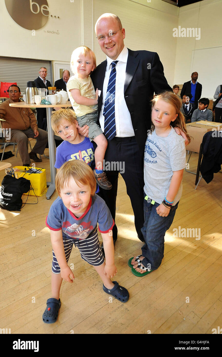 Chair of Governors Toby Young with his children, Charlie, aged three, Ludo, six, left, Freddie, four, (front), and Sasha, eight, at the newly-formed West London Free School, in Hammersmith. Stock Photo