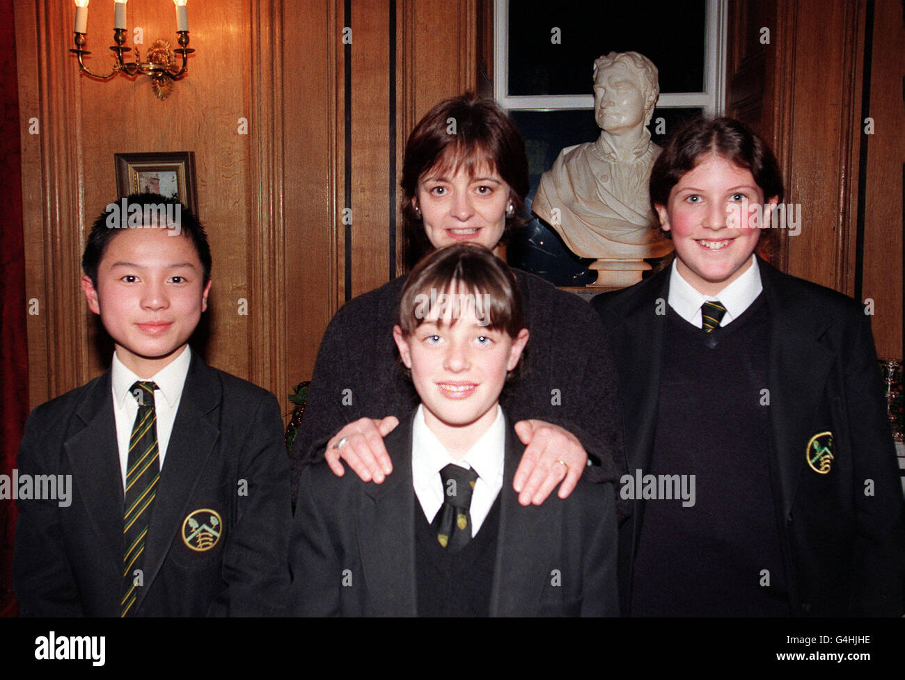 Prime Minister's wife Cherie Blair and local children from Epping Forest (l/r front) Eric Tang, Gemma Hack and Claire Saggers, at 10 Downing Street today (Tuesday), where she held a tea reception. Photo by Sean Dempsey. Stock Photo