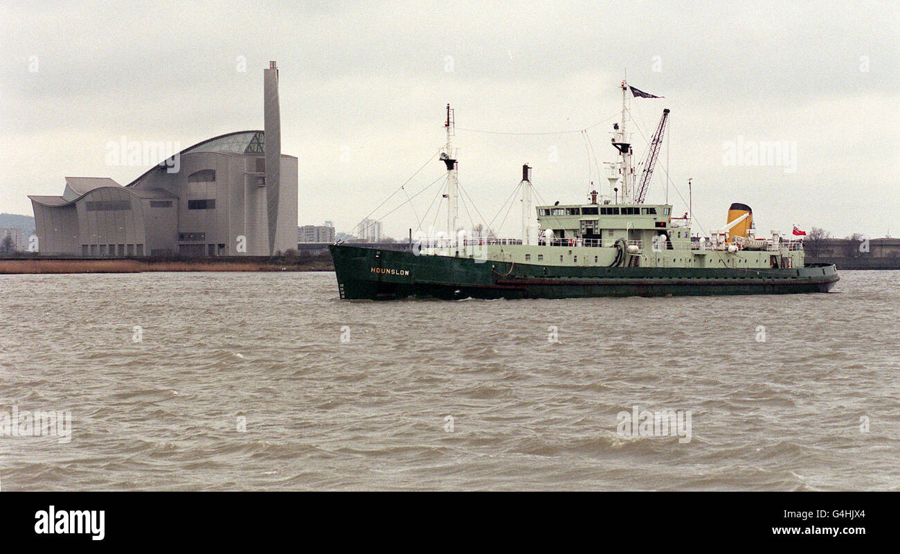 Bringing an end to an era of sewage tretment, The Hounslow - a ship which dumps treated sewage sludge in the North Sea - heads off for the last time from Crossness on the River Thames. The dumping of the toxic sludge has been banned under European Union regulations. * Regulations in force early 1999. Thames Water have built two incinerators/generators, costing 165 million, to recycle the sludge and produce electricity. Stock Photo