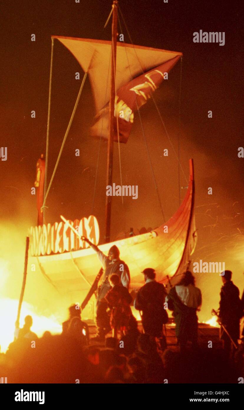 A viking long boat is burned on Calton Hill, Edinburgh, at the end of a torchlight procession along Princes Street at the beginning of Edinburgh`s fire festival to mark the start of the Hogmanay celebrations. * 1998 library filer of a viking long boat being burned on Calton Hill, Edinburgh, at the end of a torchlight procession along Princes Street to mark the start of the Hogmanay celebrations. Stock Photo