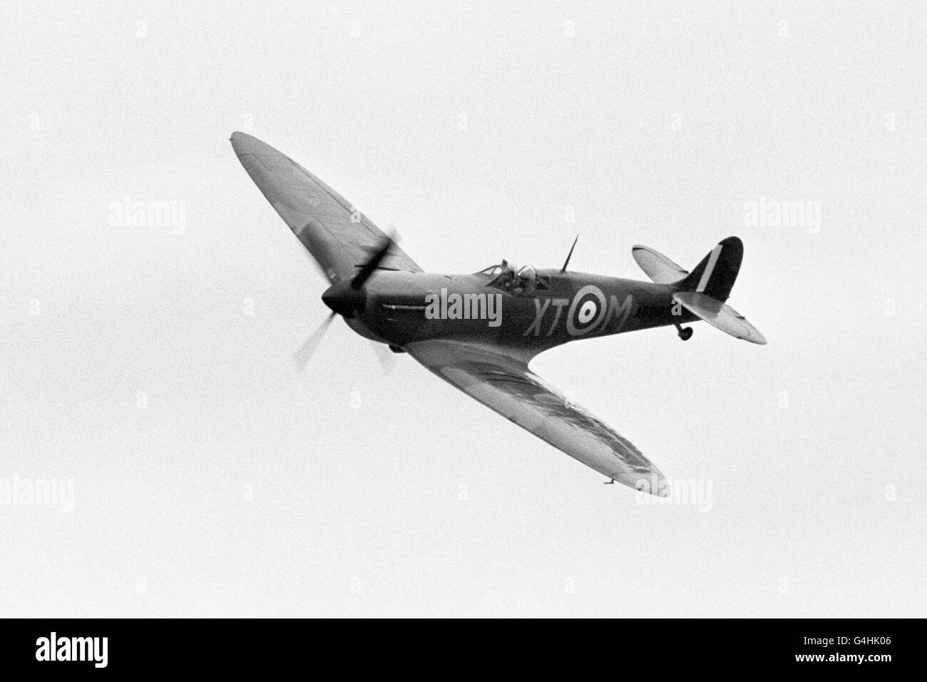 A World War Two spitfire in flight over North Weald Airfield near Harlow Stock Photo