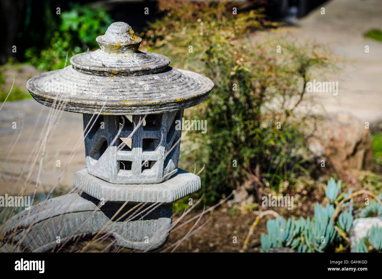 A concrete oriental garden lantern decoration Stock Photo