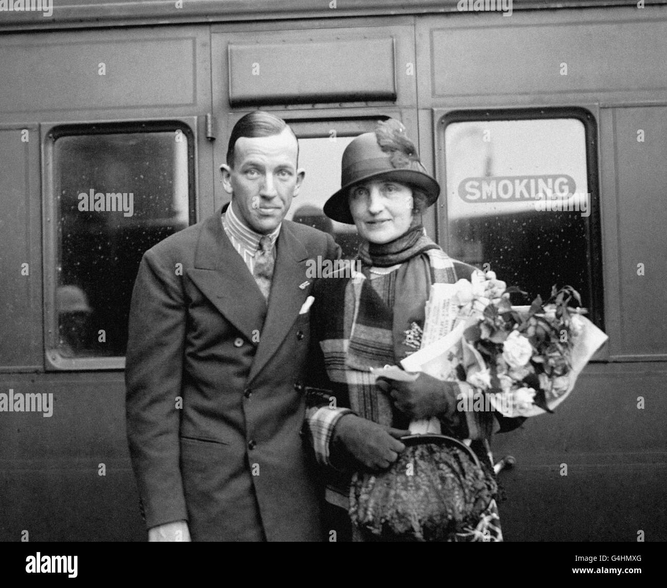 British playwright Noel Coward and British actress Lilian Braithwaite leave Waterloo Station in London heading for the United States. Stock Photo