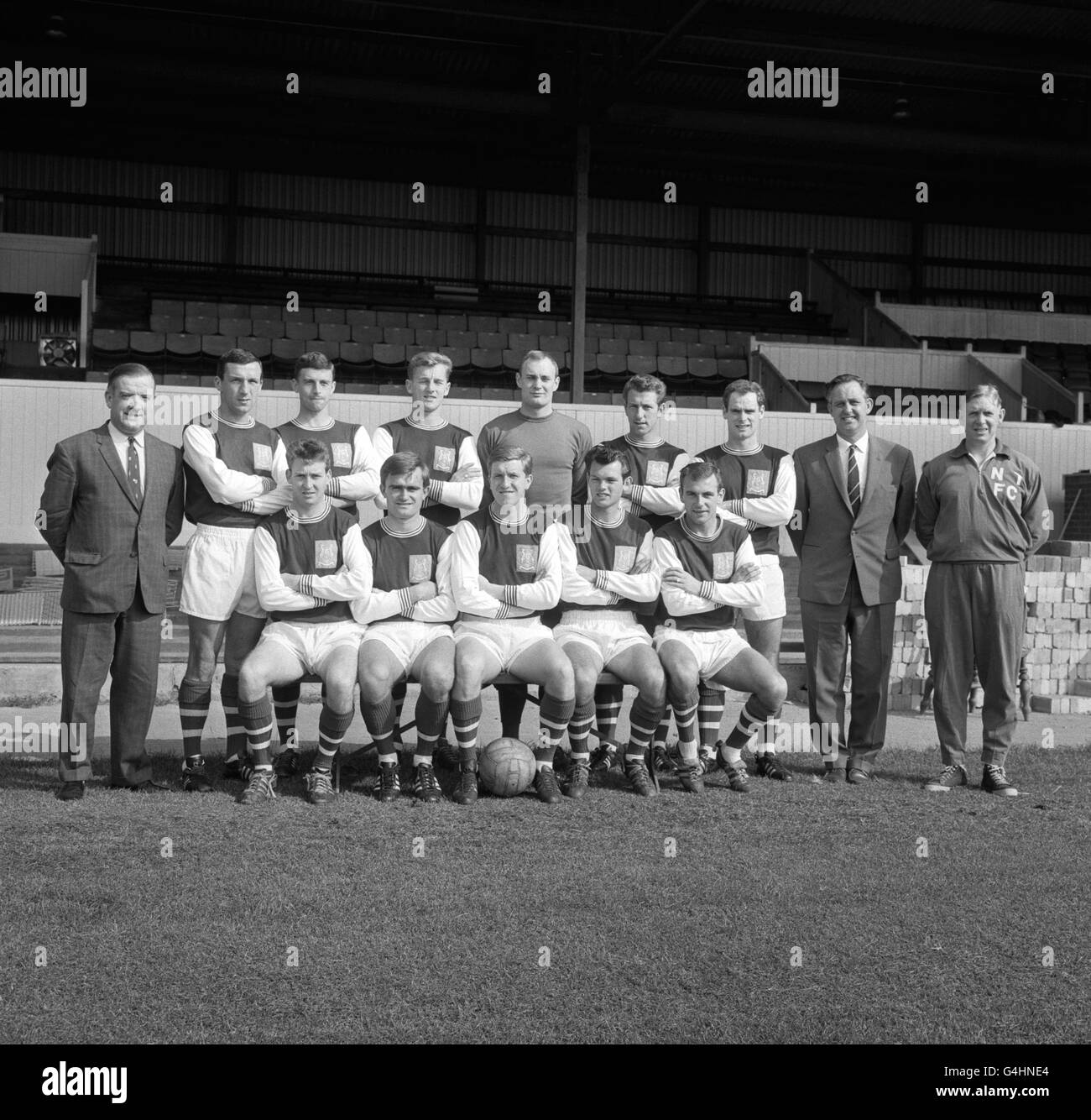 Northampton Town team group for the 1965-66 season. (top l-r) Unknown, Bill Best, Derek Leck, Tommy Robson, Bryan Harvey, Terry Branston, Joe Kiernan, Unknown and Dave Bowen (Manager). (front row l-r) Harry Walden, Bob Hunt, Bobby Brown, Barry Lines and Theo Foley. Stock Photo