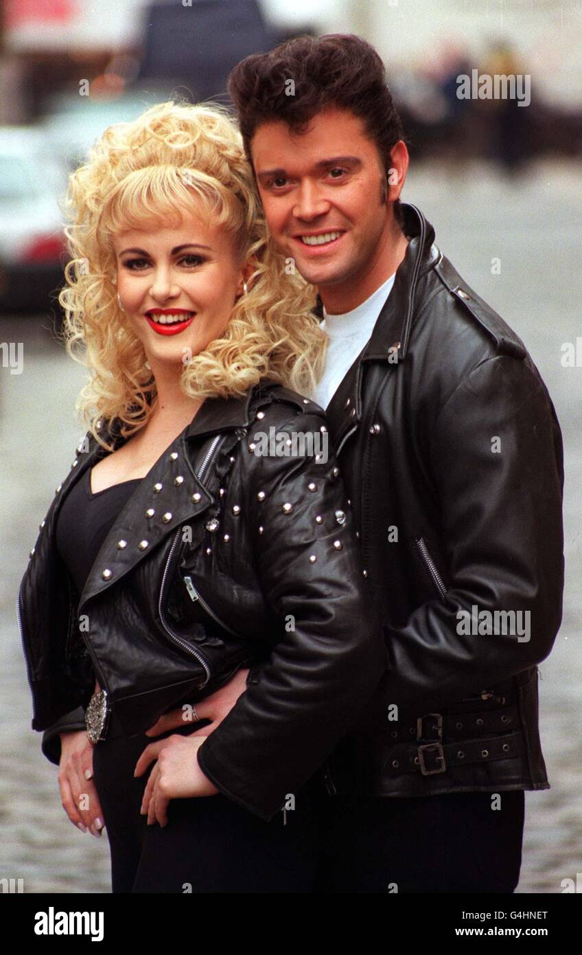 Singer Darren Day who will take over the role of Danny in the stage musical 'Grease' at the Cambridge Theatre in London with Nikki Worrell who plays Sandy in London. Darren begins his role on March 1st and will play Danny for six months. Stock Photo